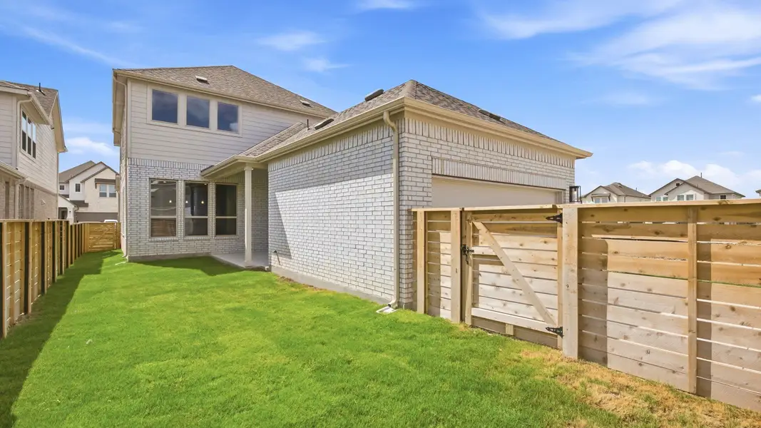Exterior details and patio area of a home in Flora, Hutto (Image 4). Exterior details and patio area of a home in Flora, Hutto (Image 4).