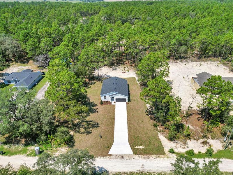 Front exterior of a new home in , Dunnellon, FL, highlighting curb appeal (Image 33).