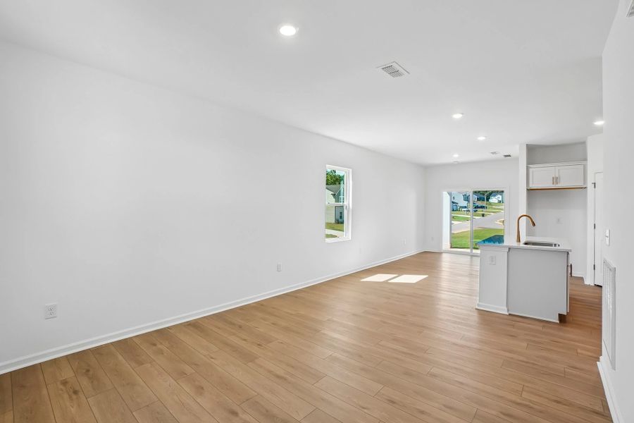 Family Room featuring the AW Collection® Serene - Open space with natural finishes and light.