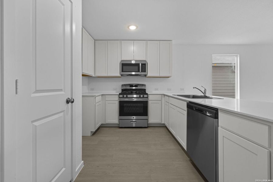 Furnished interior view inside a new home in Voss Farms, New Braunfels (Image 8).