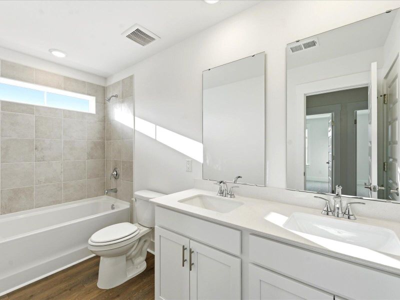 Furnished interior view inside a new home in The Coves at Lakes of Cane Bay II, Summerville (Image 14).