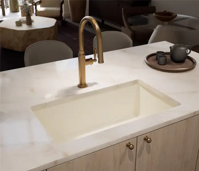 Kitchen with a breakfast bar, hanging light fixtures, wood finished floors, recessed lighting, quartzite countertop and Thermador appliances. Tranquil Palette