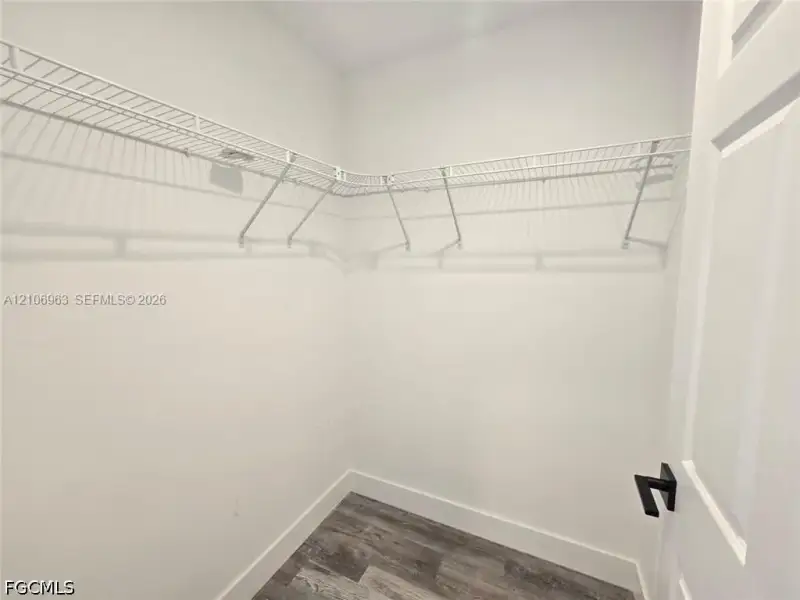 Spacious, unfurnished interior of a new home in , Port Charlotte (Image 14).