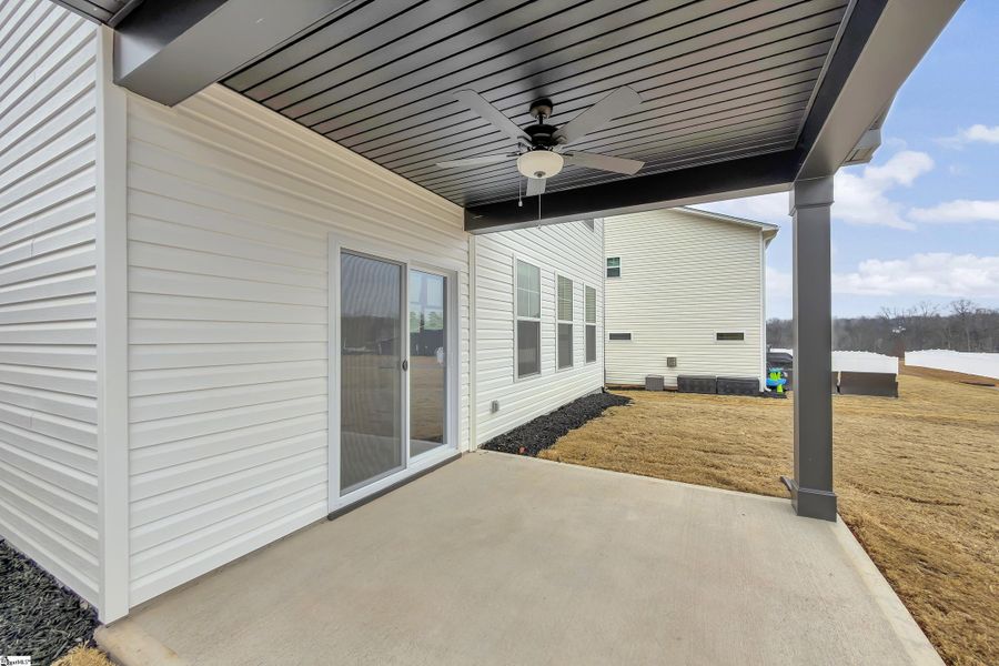 Exterior details and patio area of a home in Sedona, Greenville (Image 18).