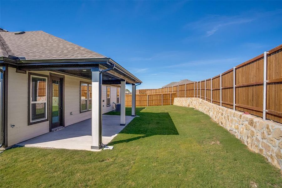 Exterior details and patio area of a home in Sierra Vista at Kelly Ranch, Aledo (Image 4).