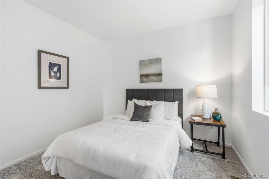 Furnished interior view inside a new home in The Cottages Collection at Ridgeline Vista, Brighton (Image 32).