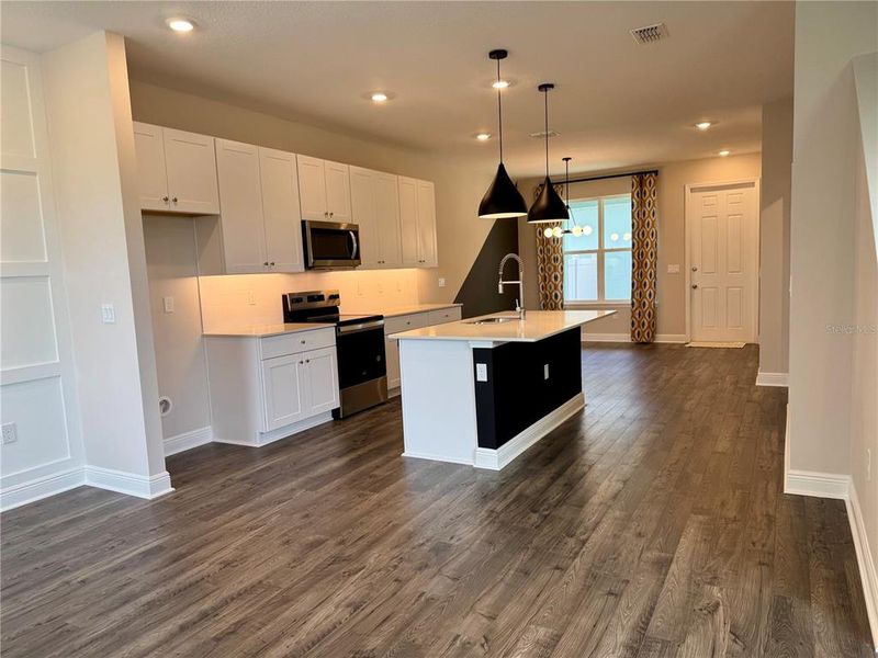 Furnished interior view inside a new home in Hamlin Ridge, Winter Garden (Image 31).