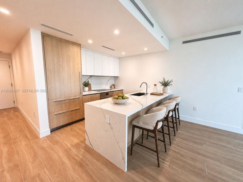 Furnished interior view inside a new home in , North Miami (Image 12).