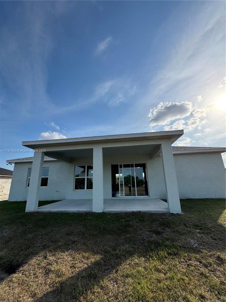 Front exterior of a new home in , Labelle, FL, highlighting curb appeal (Image 15).