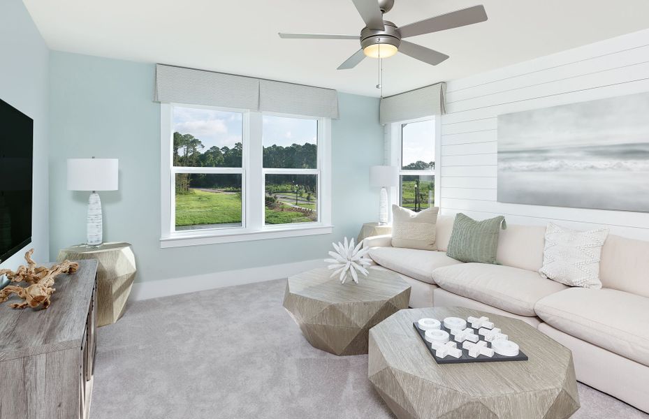 Upstairs loft offers plenty of space for guests to retreat, or to have a media room.