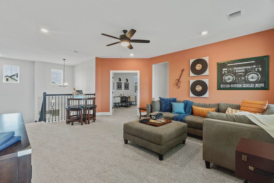 Representative furnished interior of a home built from the Hailey by Chesmar Homes in Village at Three Oaks, Seguin (Image 12).
