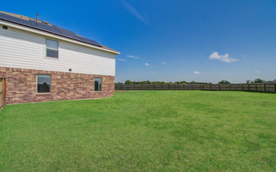 Side of the house with the solar panels Side of the house with the solar panels