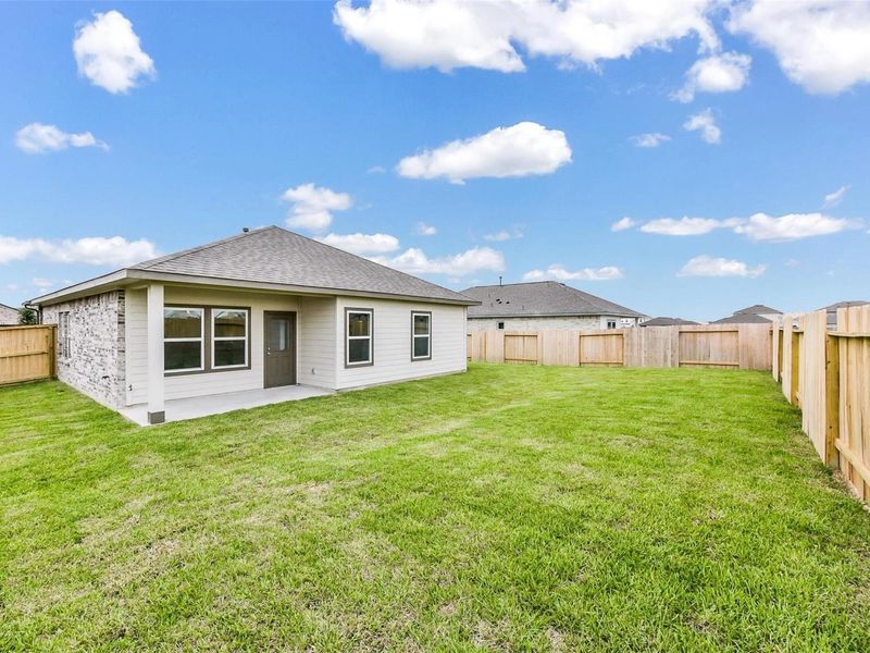 Exterior details and patio area of a home in River Ranch Meadows, Dayton (Image 25). Exterior details and patio area of a home in River Ranch Meadows, Dayton (Image 25).