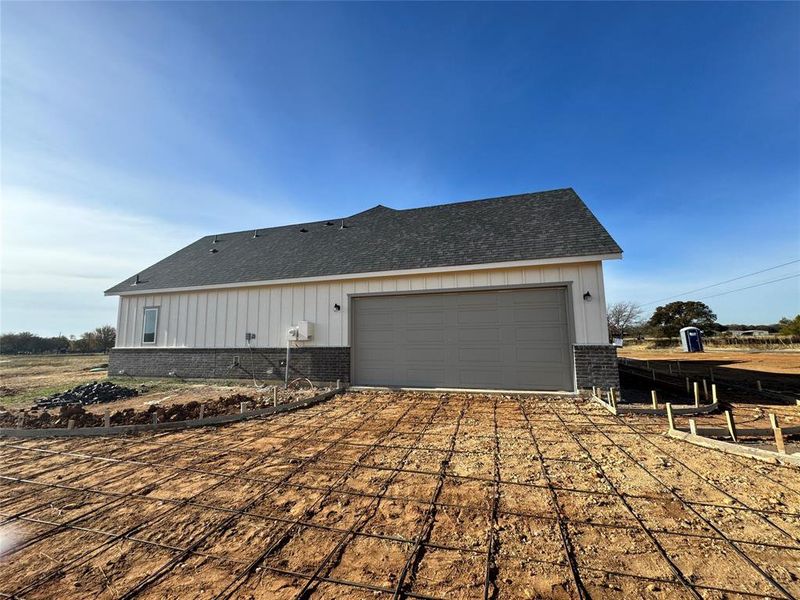 View of home's exterior with a garage