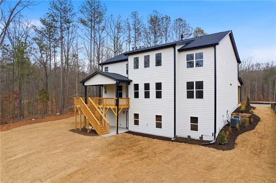 Exterior details and patio area of a home in Sterlington, Canton (Image 26).