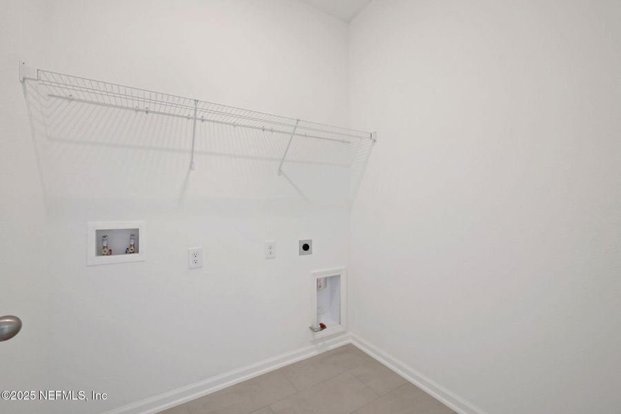 Spacious, unfurnished interior of a new home in TrailMark, St. Augustine (Image 36).