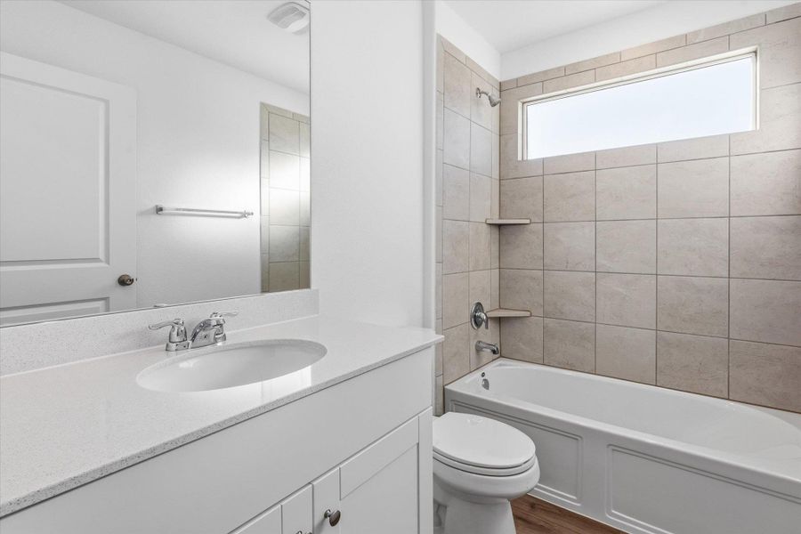 Furnished interior view inside a new home in Thunder Rock: Watermill Collection, Marble Falls (Image 16).