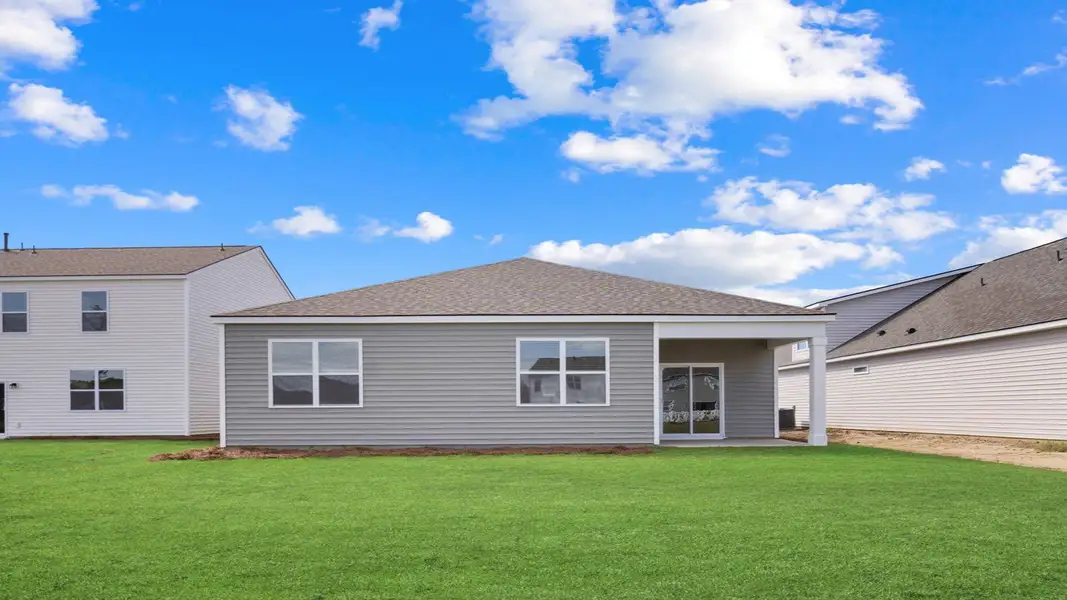 Exterior details and patio area of a home in The Lakes at North Glynn, Brunswick (Image 2).