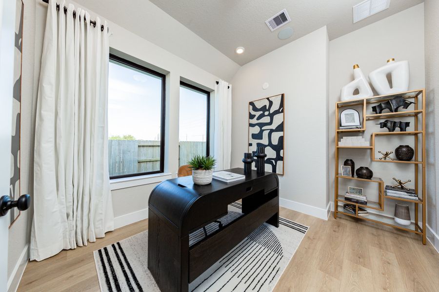 Representative furnished interior of a home built from the Cambridge by Beazer Homes in Meridiana, Iowa Colony (Image 7).