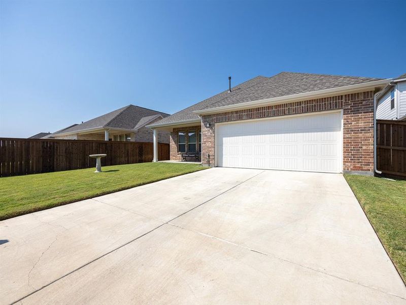 Front exterior of a new home in , Waxahachie, TX, highlighting curb appeal (Image 18). Front exterior of a new home in , Waxahachie, TX, highlighting curb appeal (Image 18).