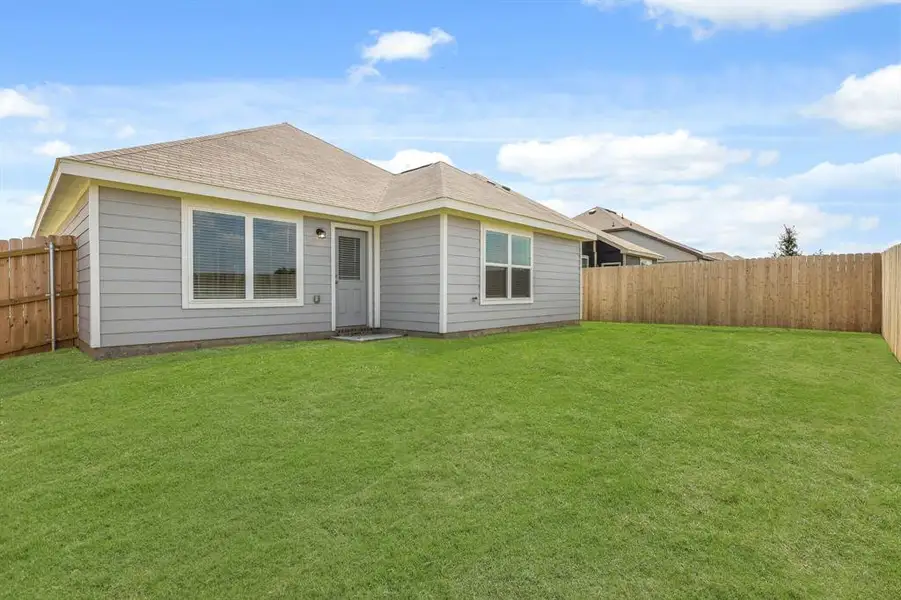 Front exterior of a new home in Sycamore Landing, Fort Worth, TX, highlighting curb appeal (Image 2). Front exterior of a new home in Sycamore Landing, Fort Worth, TX, highlighting curb appeal (Image 2).