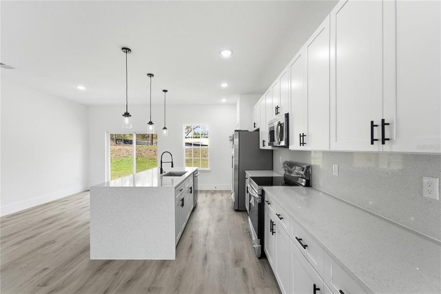 Furnished interior view inside a new home in , Dunnellon (Image 7).