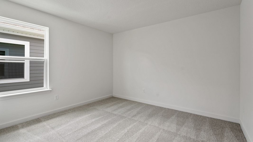 Second Bedroom in the Mandarin by DRB Homes in Trinity Place located in St. Cloud, FL Second Bedroom in the Mandarin by DRB Homes in Trinity Place located in St. Cloud, FL