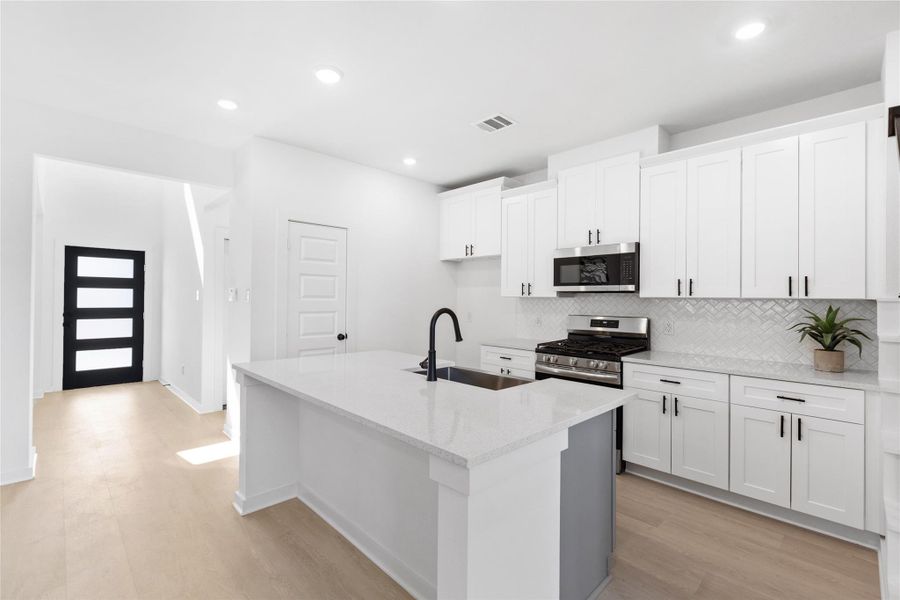 Furnished interior view inside a new home in Kendall Lakes, Alvin (Image 18).