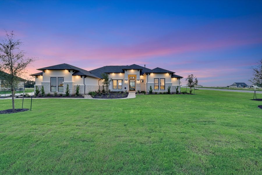 Representative exterior photo of a completed home built from the Bandera II by Giddens Homes in Leander Estates, Leander, TX (Image 8).