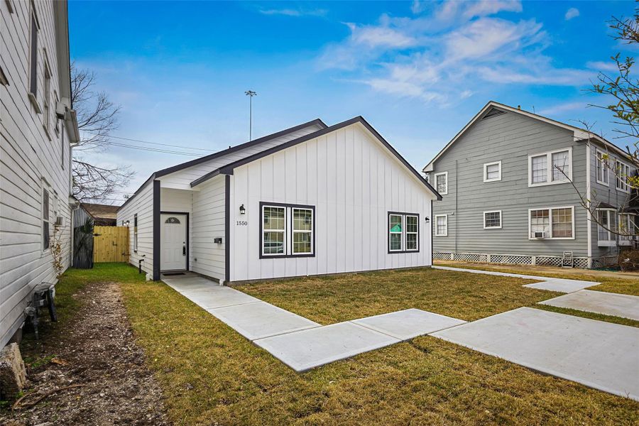 Exterior details and patio area of a home in , Houston (Image 3).