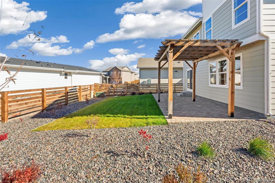 Exterior details and patio area of a home in Legato, Commerce City (Image 4).