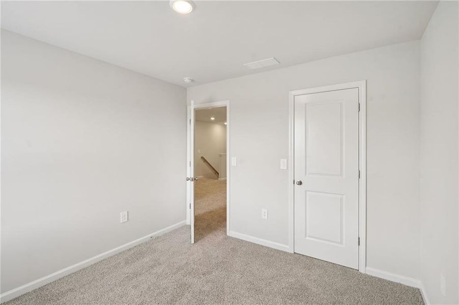 Spacious, unfurnished interior of a new home in Avalon - Vista Series, Conyers (Image 18). Spacious, unfurnished interior of a new home in Avalon - Vista Series, Conyers (Image 18).