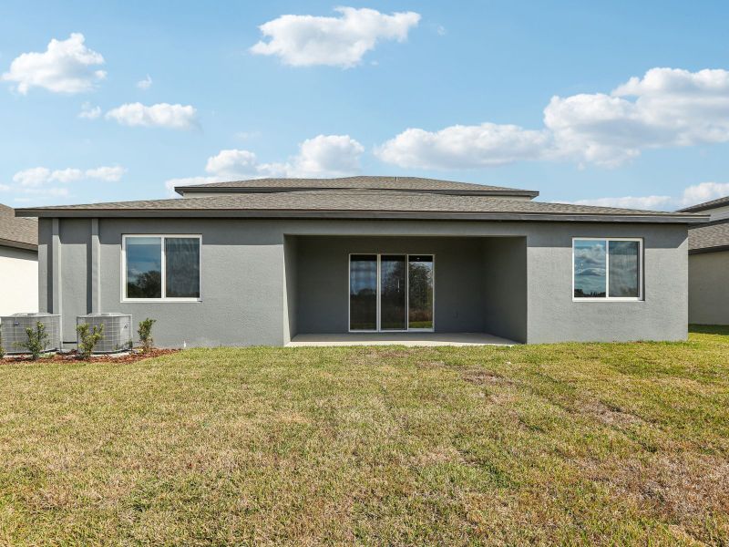 Exterior details and patio area of a home in Two Rivers - Signature Series, Zephyrhills (Image 3).