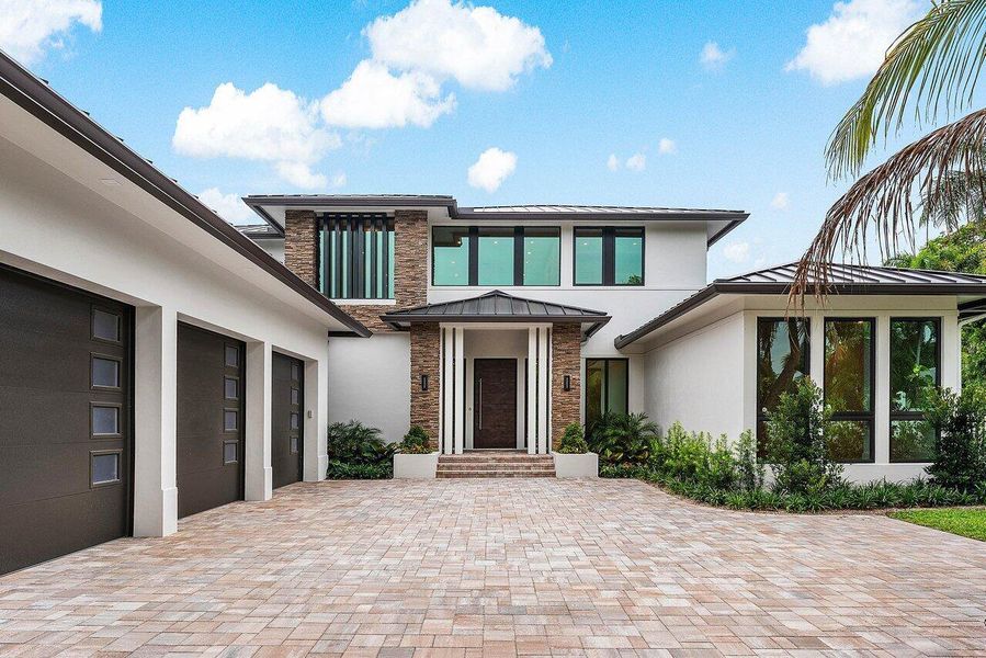 Front exterior of a new home in , Delray Beach, FL, highlighting curb appeal (Image 2).