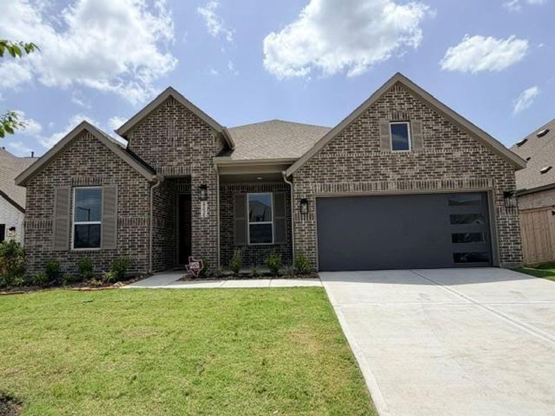 Front exterior of a new home in Kresston, Montgomery, TX, highlighting curb appeal (Image 1). Front exterior of a new home in Kresston, Montgomery, TX, highlighting curb appeal (Image 1).