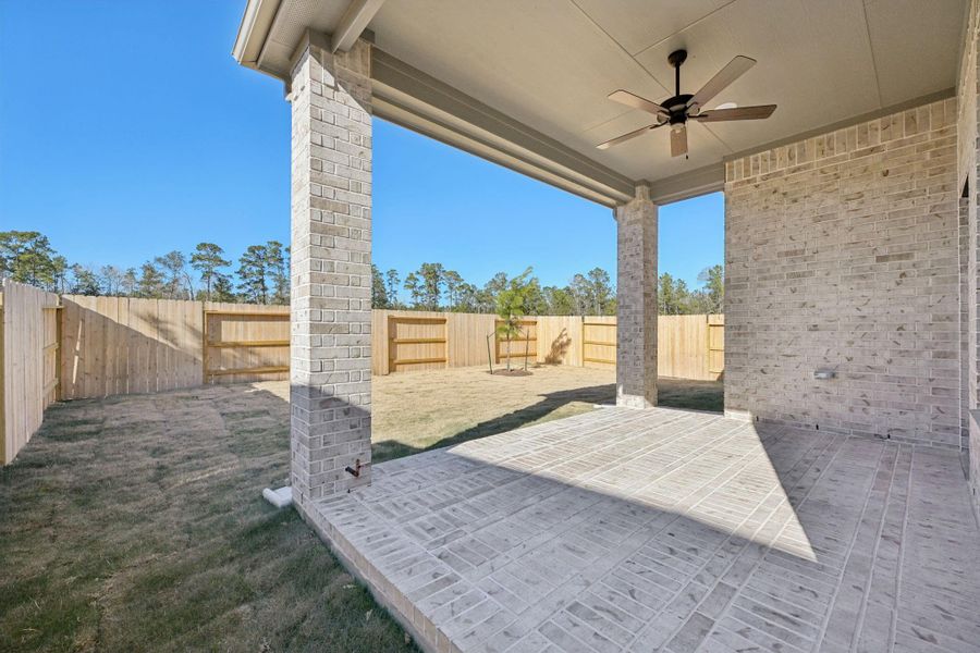Exterior details and patio area of a home in Evergreen, Conroe (Image 18).