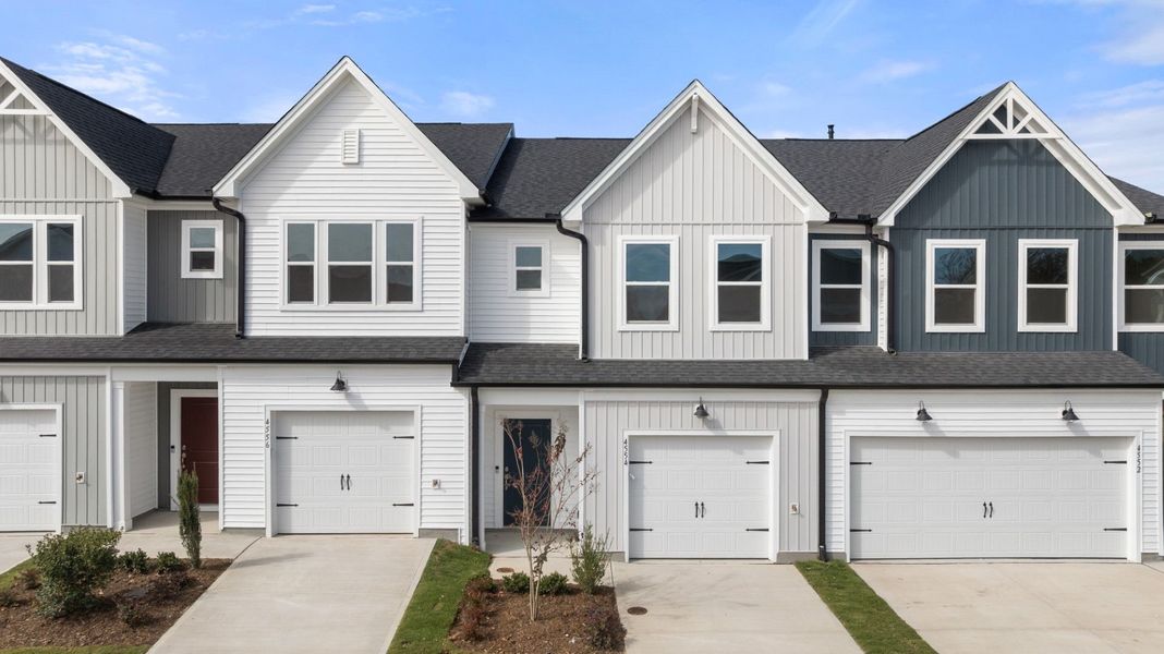 Front exterior of a new home in McConnell Ridge, McLeansville, NC, highlighting curb appeal (Image 1).
