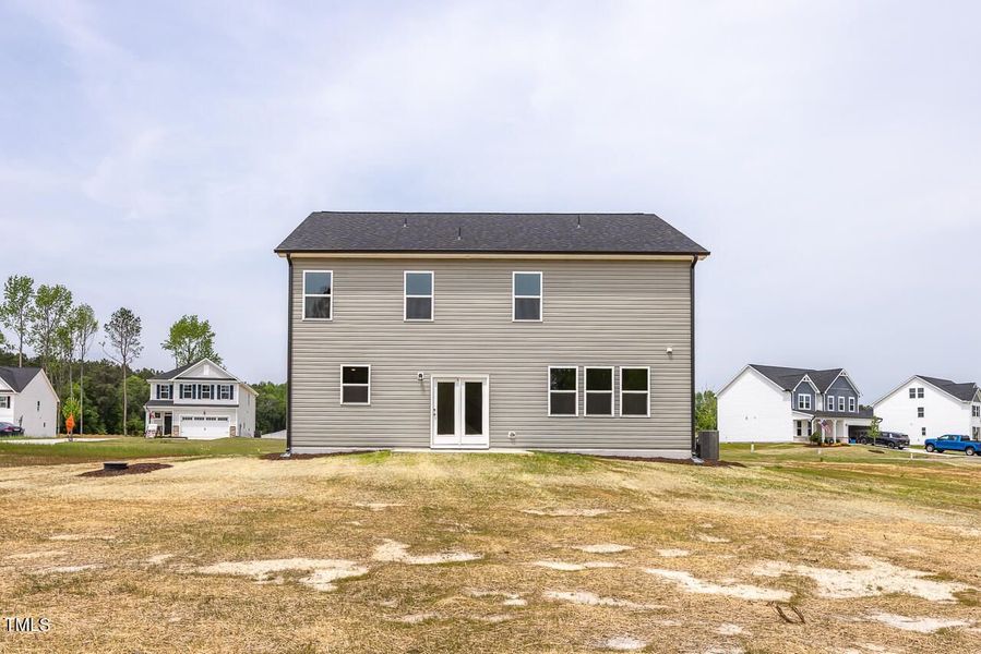 Front exterior of a new home in Wellers Knoll, Lillington, NC, highlighting curb appeal (Image 54).
