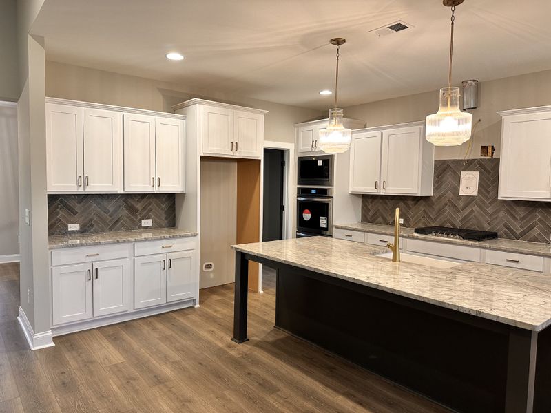Furnished interior view inside a new home in The Reserve at Red Oaks, Carrollton (Image 6).