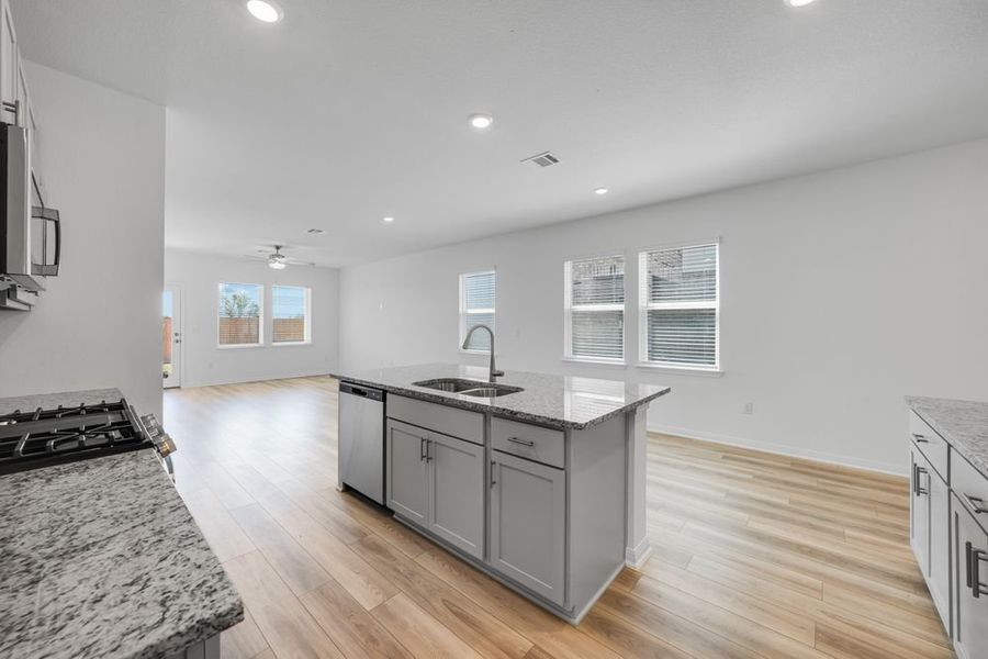 Furnished interior view inside a new home in Longview 40s, Del Valle (Image 8).