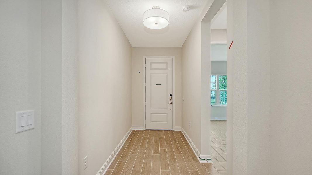 Spacious, unfurnished interior of a new home in Grand Park Real Estate and Homes for Sale in Sarasota, FL - Neal Communities, Sarasota (Image 23).