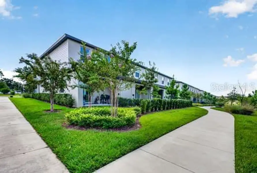 Front exterior of a new home in , Land O' Lakes, FL, highlighting curb appeal (Image 1). Front exterior of a new home in , Land O' Lakes, FL, highlighting curb appeal (Image 1).