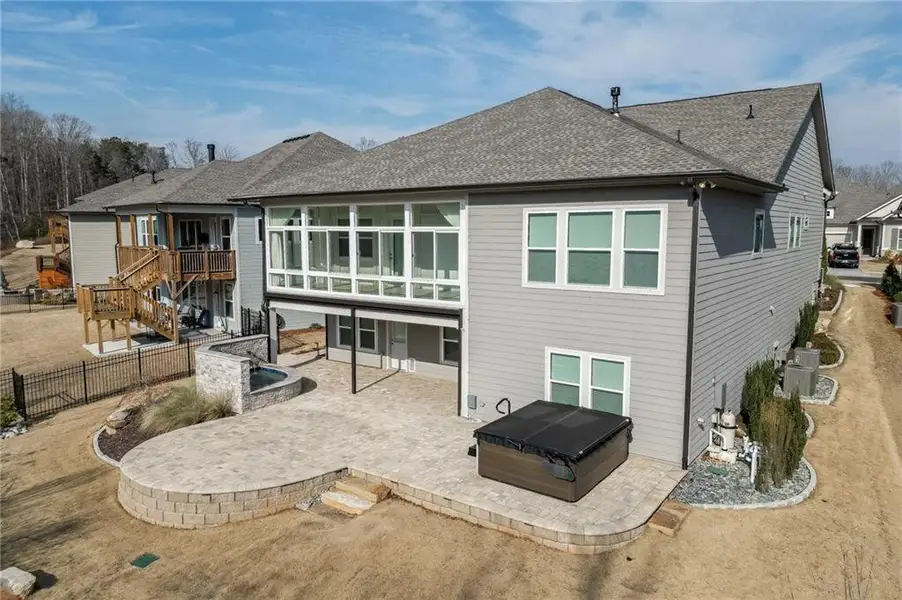 Exterior details and patio area of a home in The Retreat at Sterling on the Lake 48', Flowery Branch (Image 25).