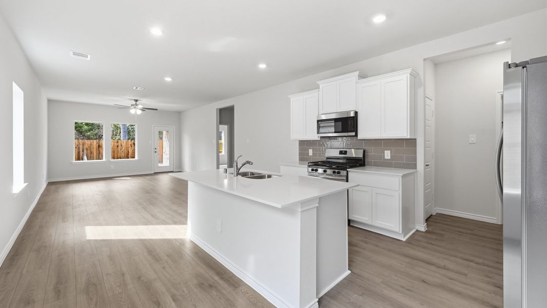 Representative furnished interior of a home built from the Jackson by D.R. Horton in Silverado, Aubrey (Image 5).