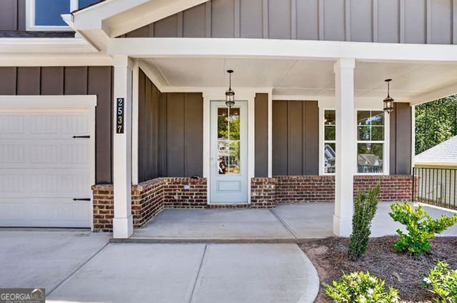 Exterior details and patio area of a home in The Manor at Gainesville Township, Gainesville (Image 21).