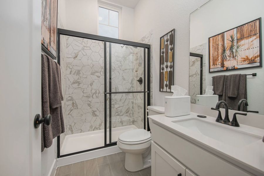 Representative furnished interior of a home built from the Charlene by Chesmar Homes in Meyer Ranch, New Braunfels (Image 17).