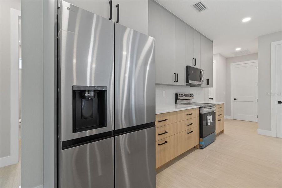 Furnished interior view inside a new home in , Port Charlotte (Image 17).