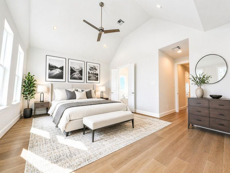 Rich wood floors in the primary bedroom! Virtual staging added.