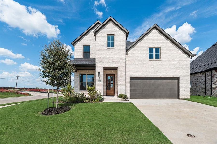Front exterior of a new home in Devonshire, Heath, TX, highlighting curb appeal (Image 25).