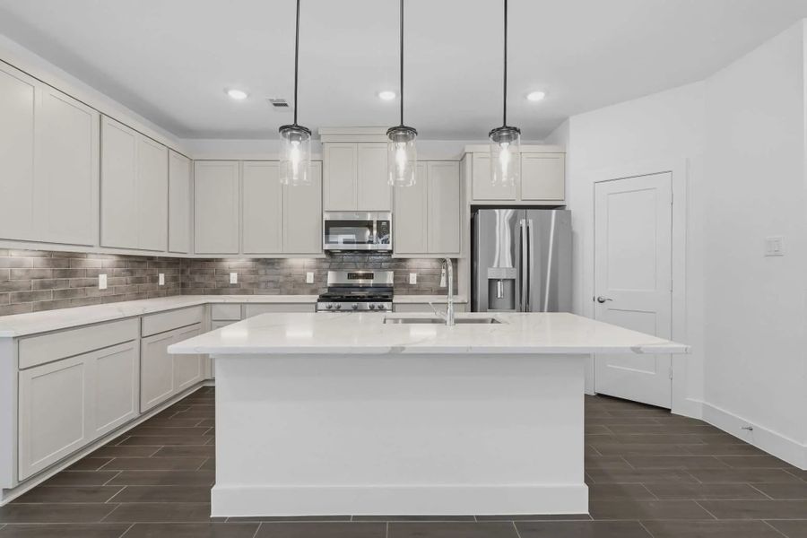Representative furnished interior of a home built from the Carriagehouse by Chesmar Homes in Meridiana Townhomes, Iowa Colony (Image 62).